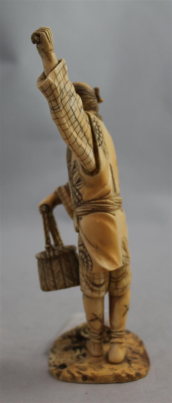 Japanese Meiji period ivory okimono of a grape picker, Meiji period, 17.2cm, faults(-)